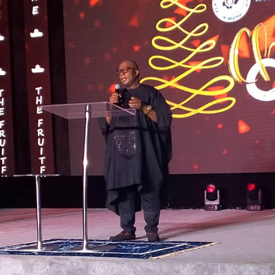 Dr. Israel Lebura Ngbuelo during the Christmas Carol program